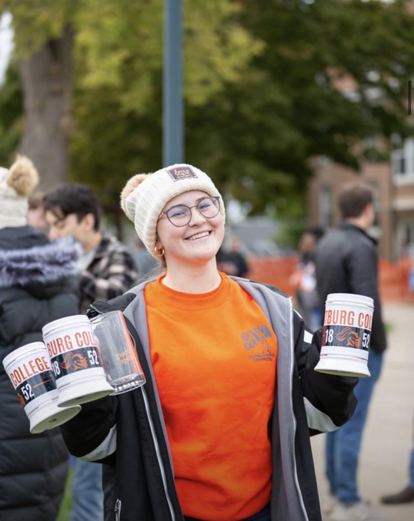 Maia Abrahamson lends a hand at Wartburg's Oktoberfest.
