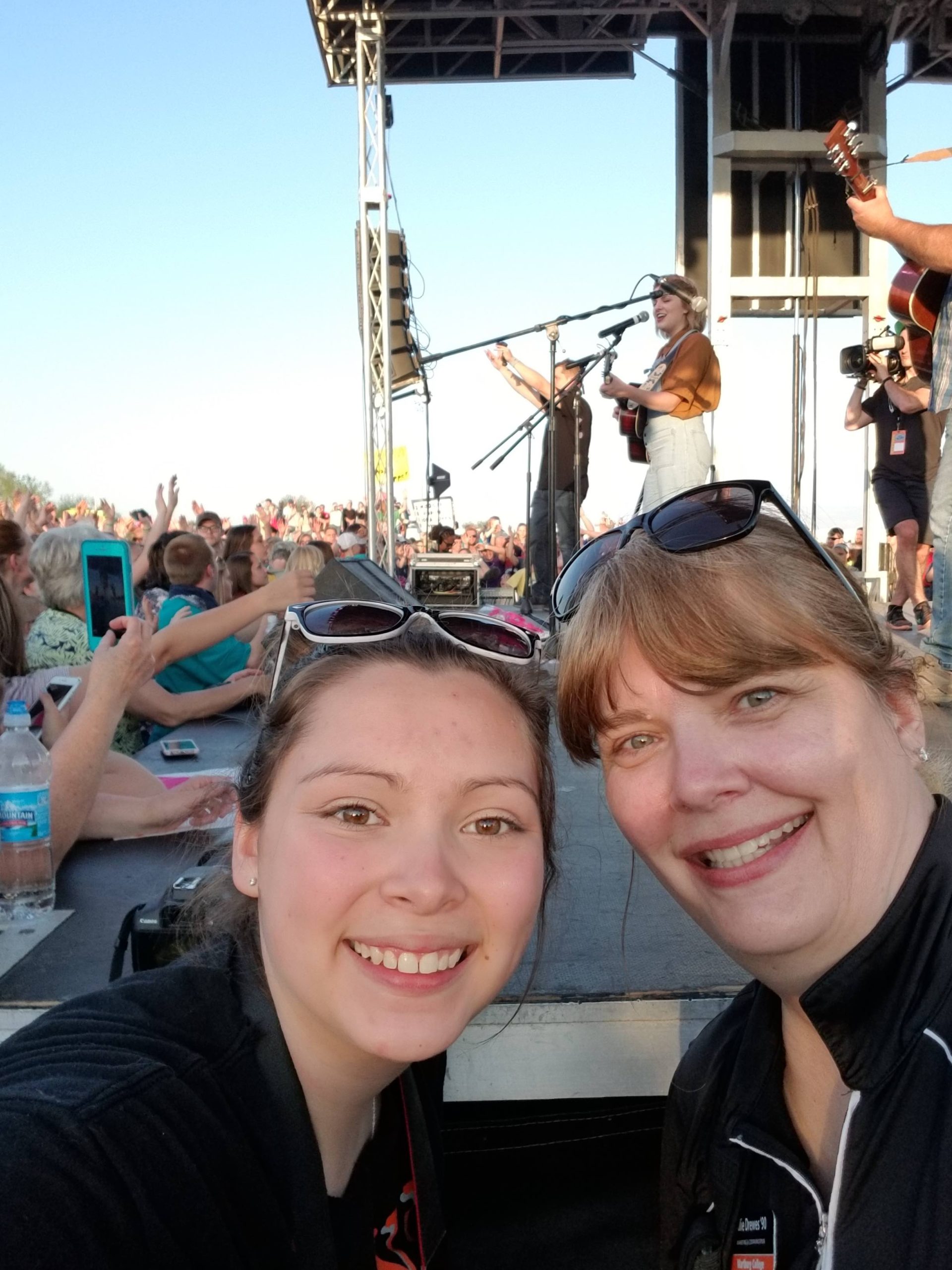 Lexi Bodzioch and Julie Drewes photograph the Maddie Poppe American Idol concert in Allison.