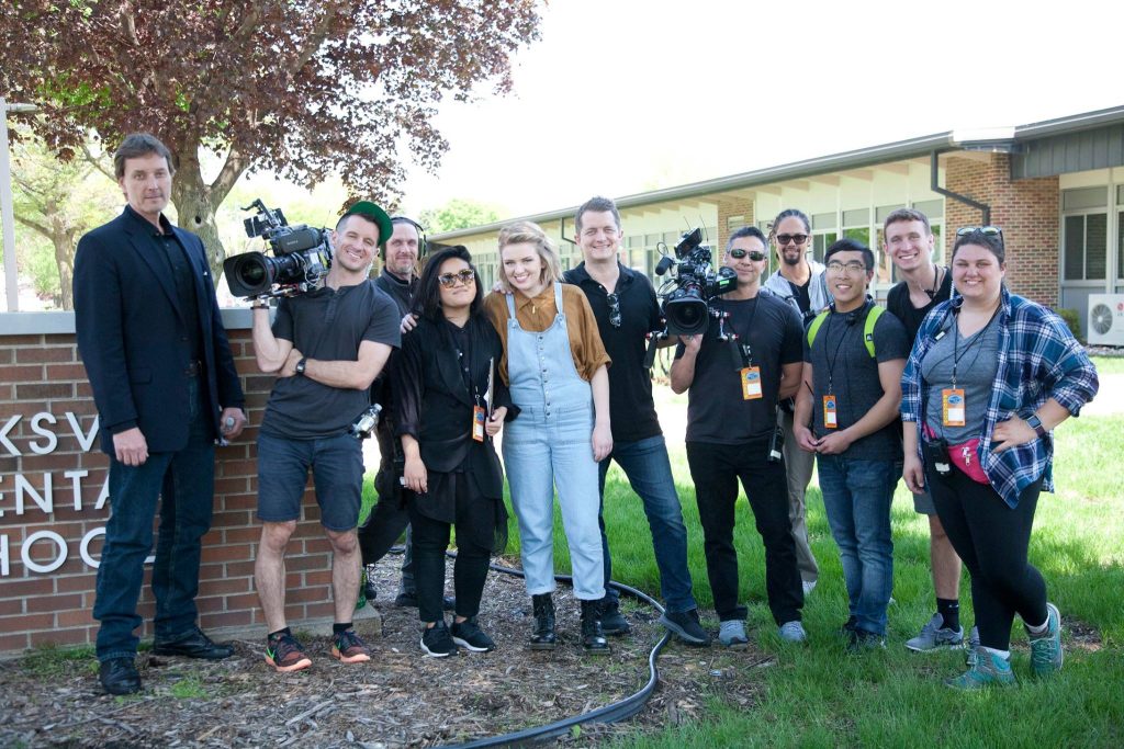 Wartburg students Matt Ohl (third from right) and McKenzie Kielman (far right) served as production assistants when American Idol and Maddie Poppe came to Clarksville.