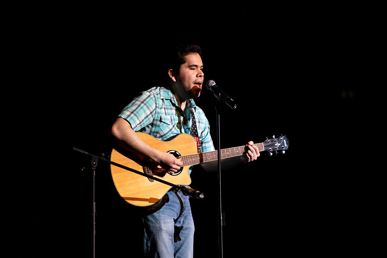 Student with guitar at Culture Show