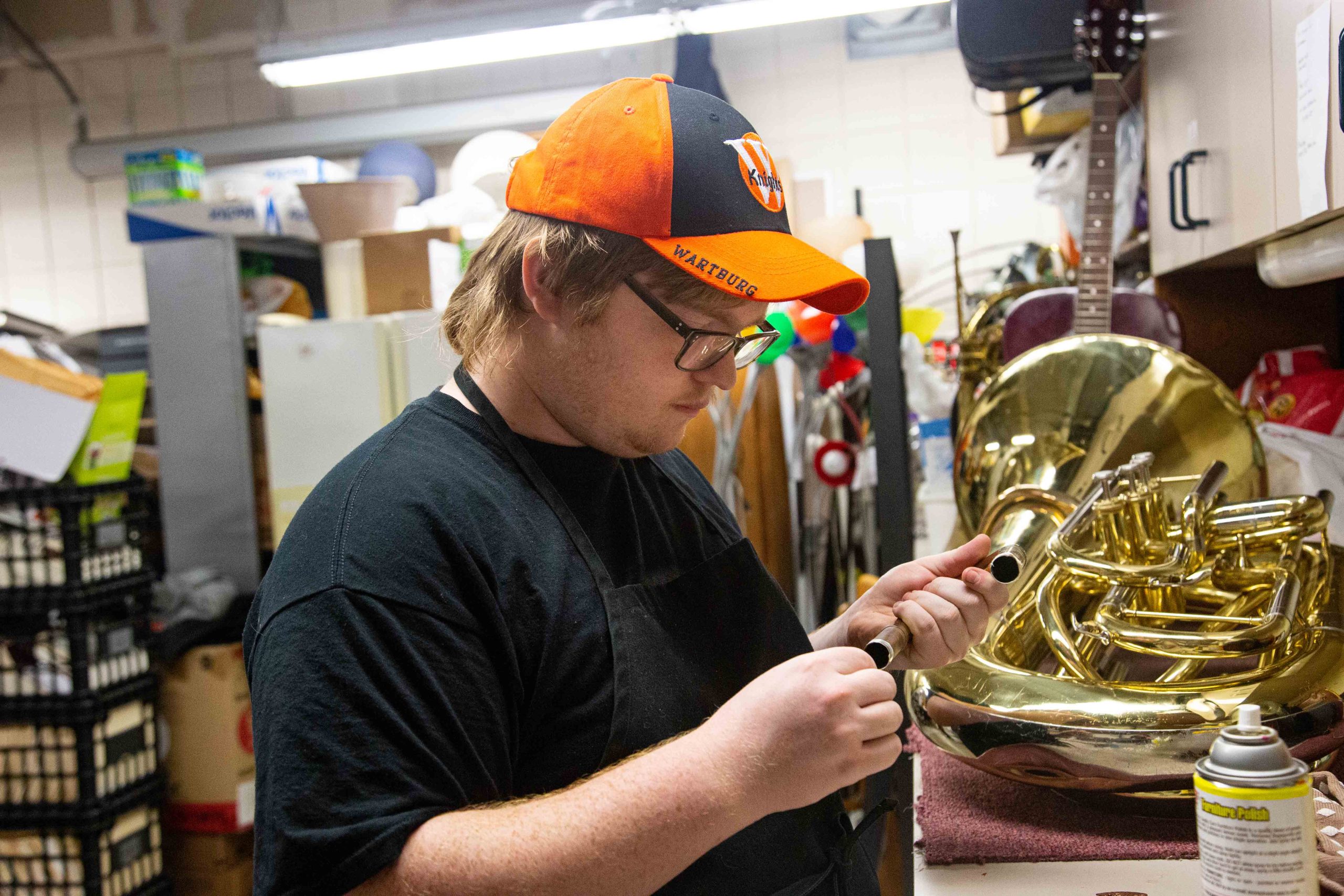 Jared Knapp ’22 prepares a tuning slide to be reassembled.