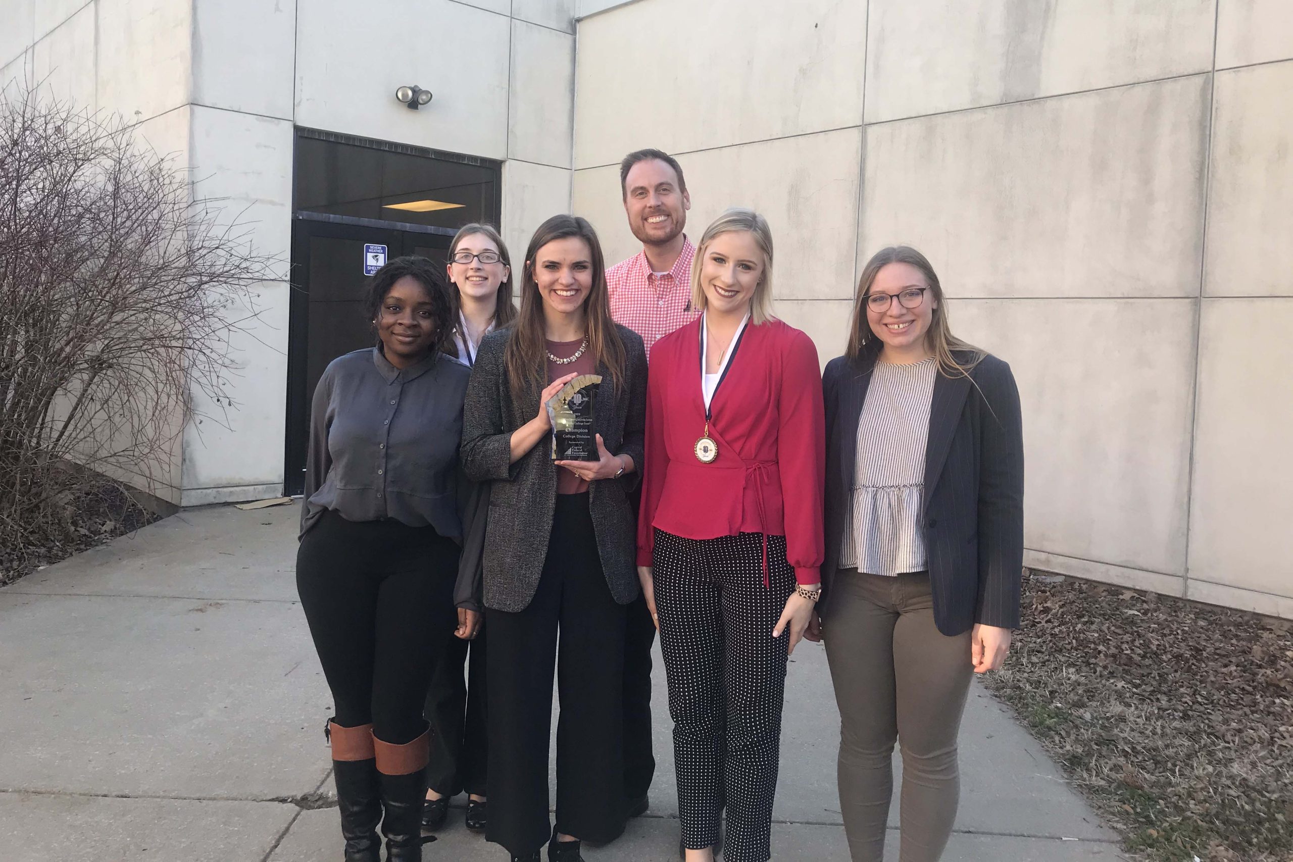 Barbara Tigere, Jenna Smuszkiewicz, Jenna Brannaman, Michael Gleason, Gene Anne Berst and Sara Martin took first place at the Leadership Challenge Event.