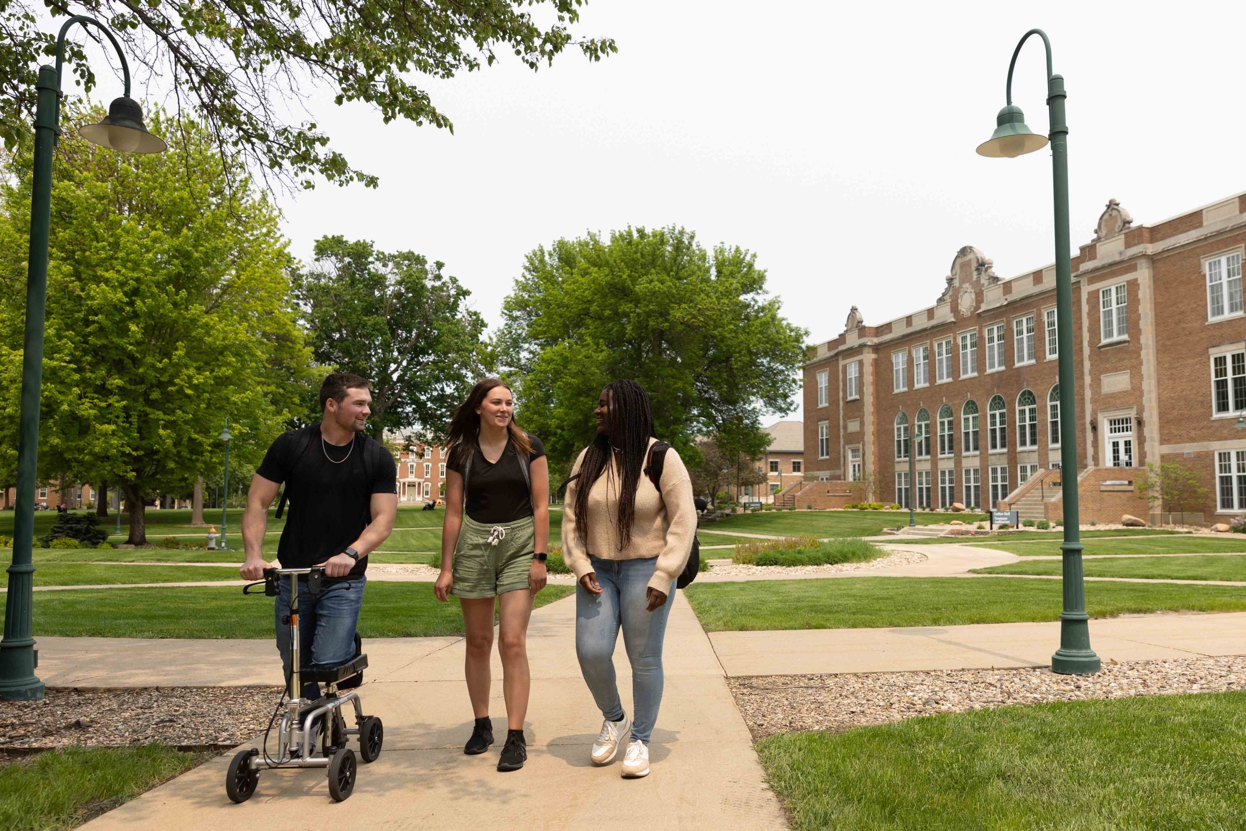 Students walking in front of Luther Hall