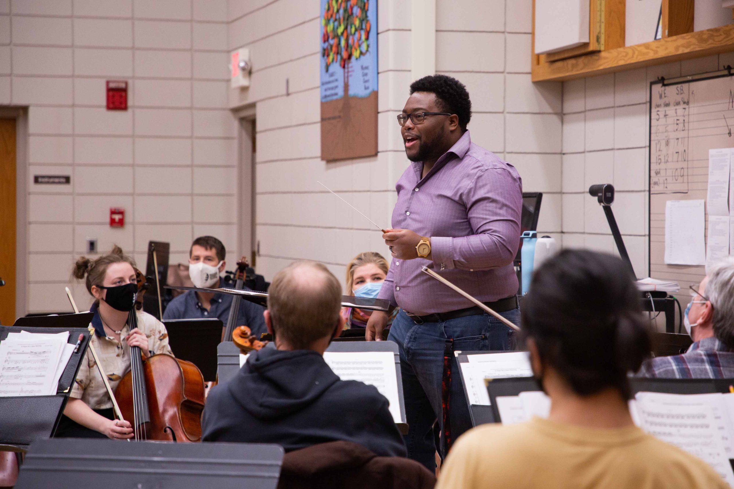Denzel Washington conducts the Wartburg Community Symphony during a rehearsal.