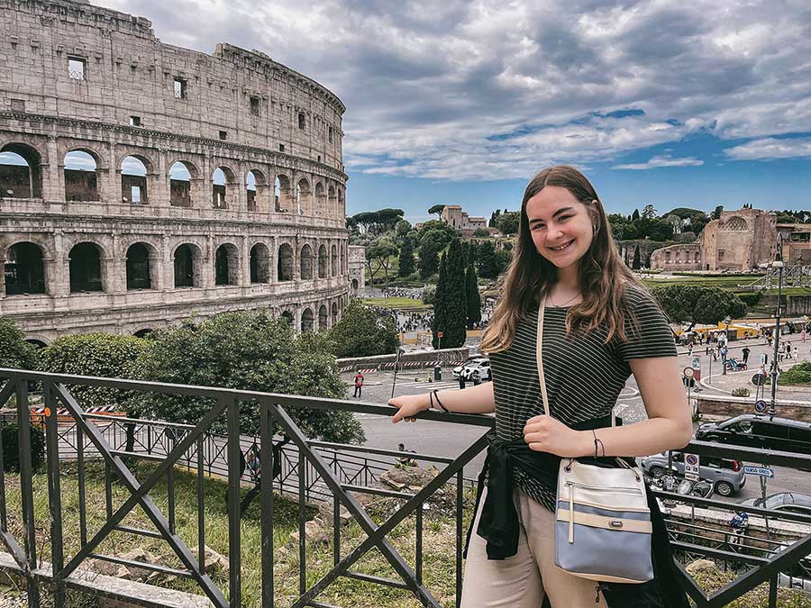 Sophia Broers stands in from of the Colosseum in Rome, Italy.