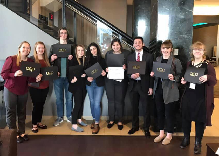 The Trumpet staff with their ACP awards.