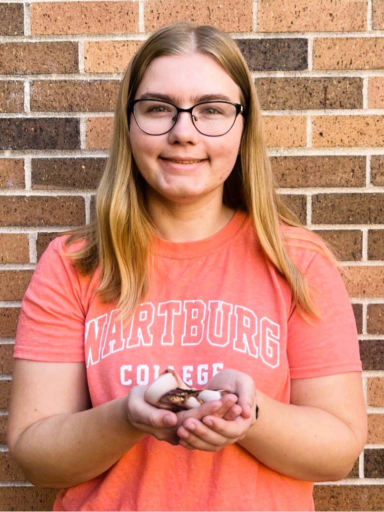 Kylie Buchholz holding a snake