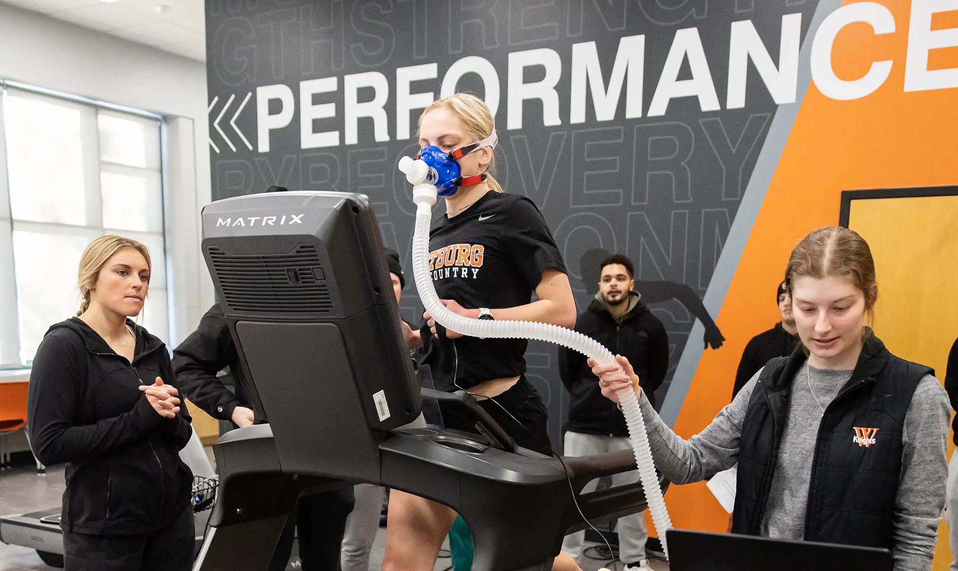Students using the VO2 equipment for research in a lab