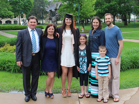 Friendship Family with graduate at commencement