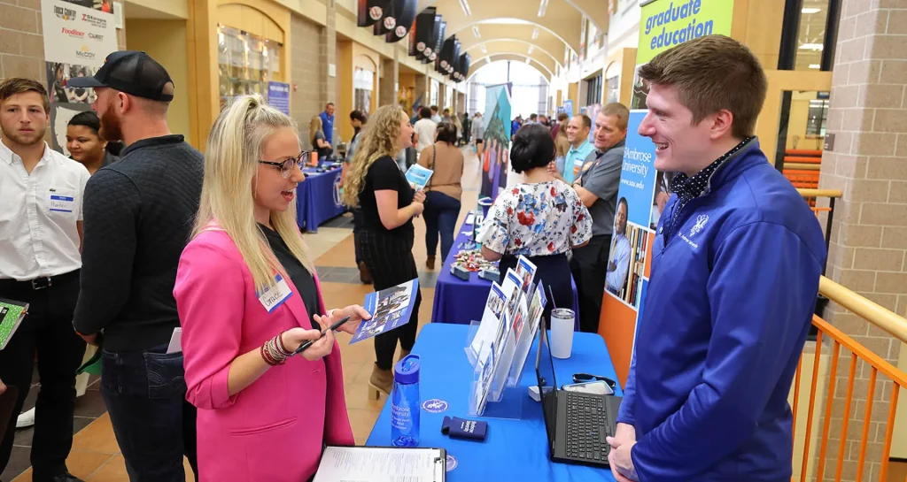 Career Expo - Employer talking with a student