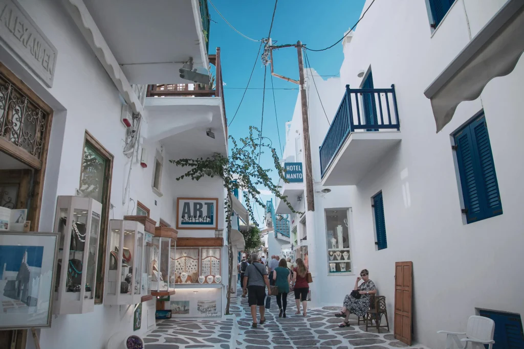 cityscape in greece with people walking on the street