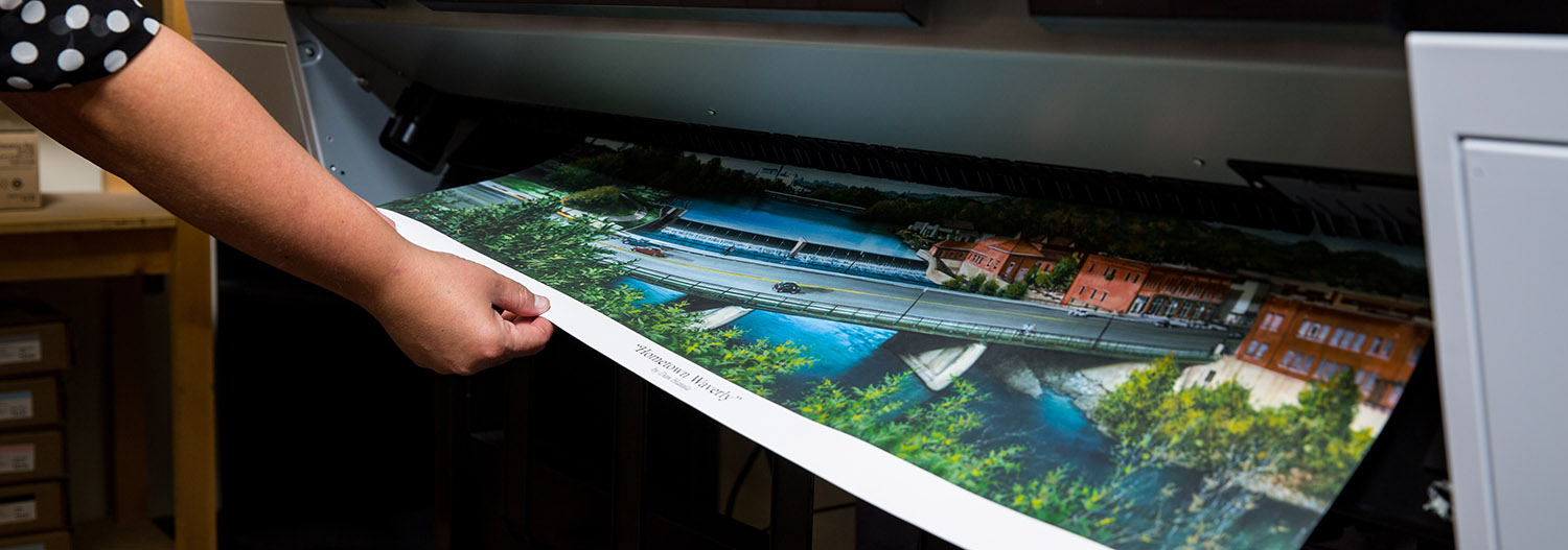 Sample art print coming off the large format printer