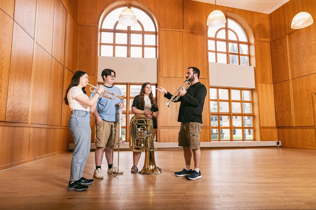 Professor works with students in Orchestra Hall