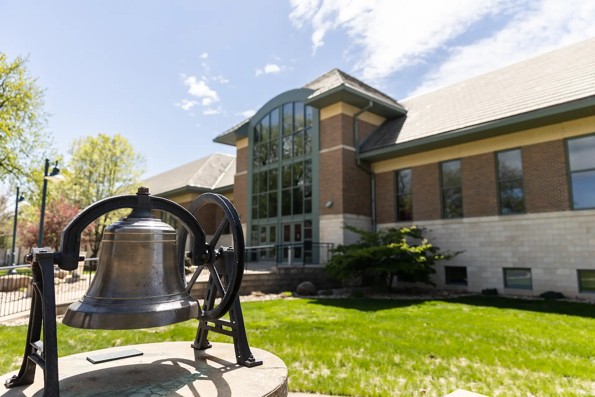 The W with the victory bell