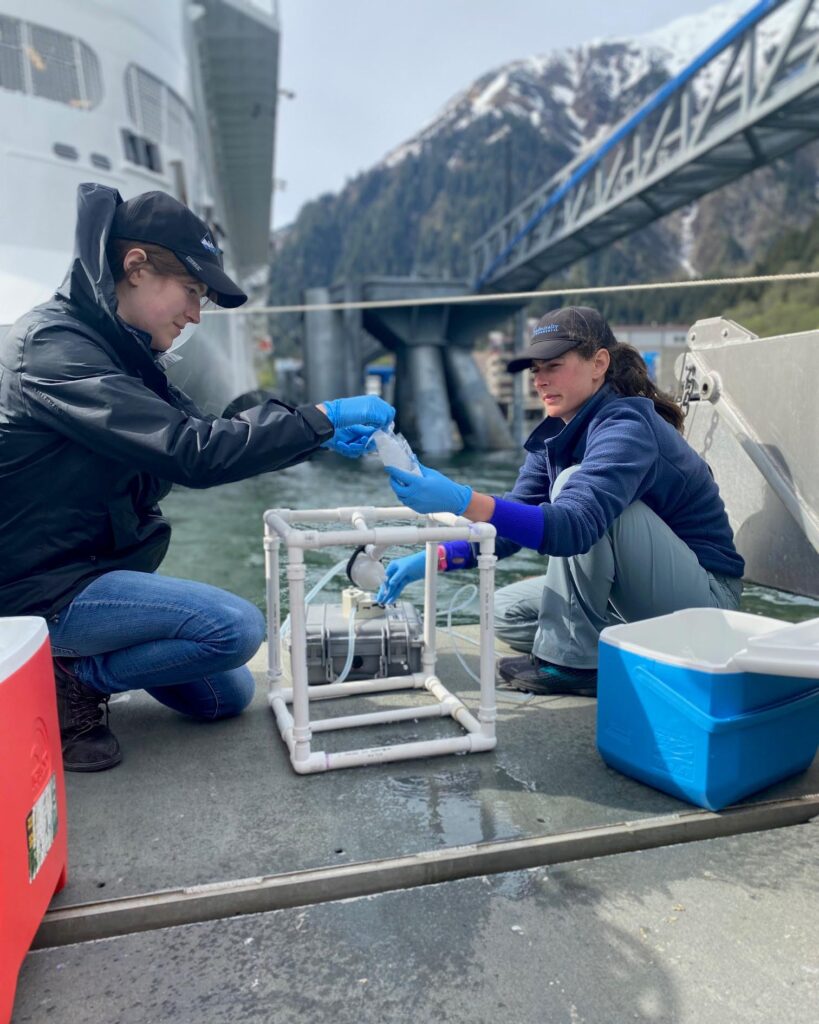 Hope VanZinderen O'Neill (right) tests water with a colleague.