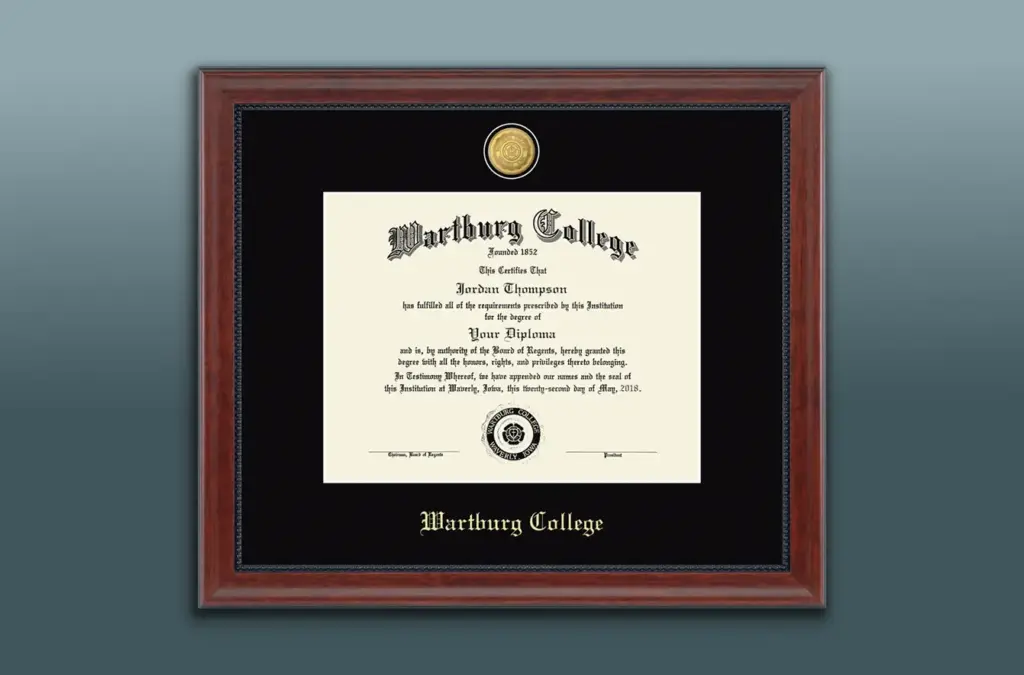 Wartburg College Diploma in Frame on gray background.
