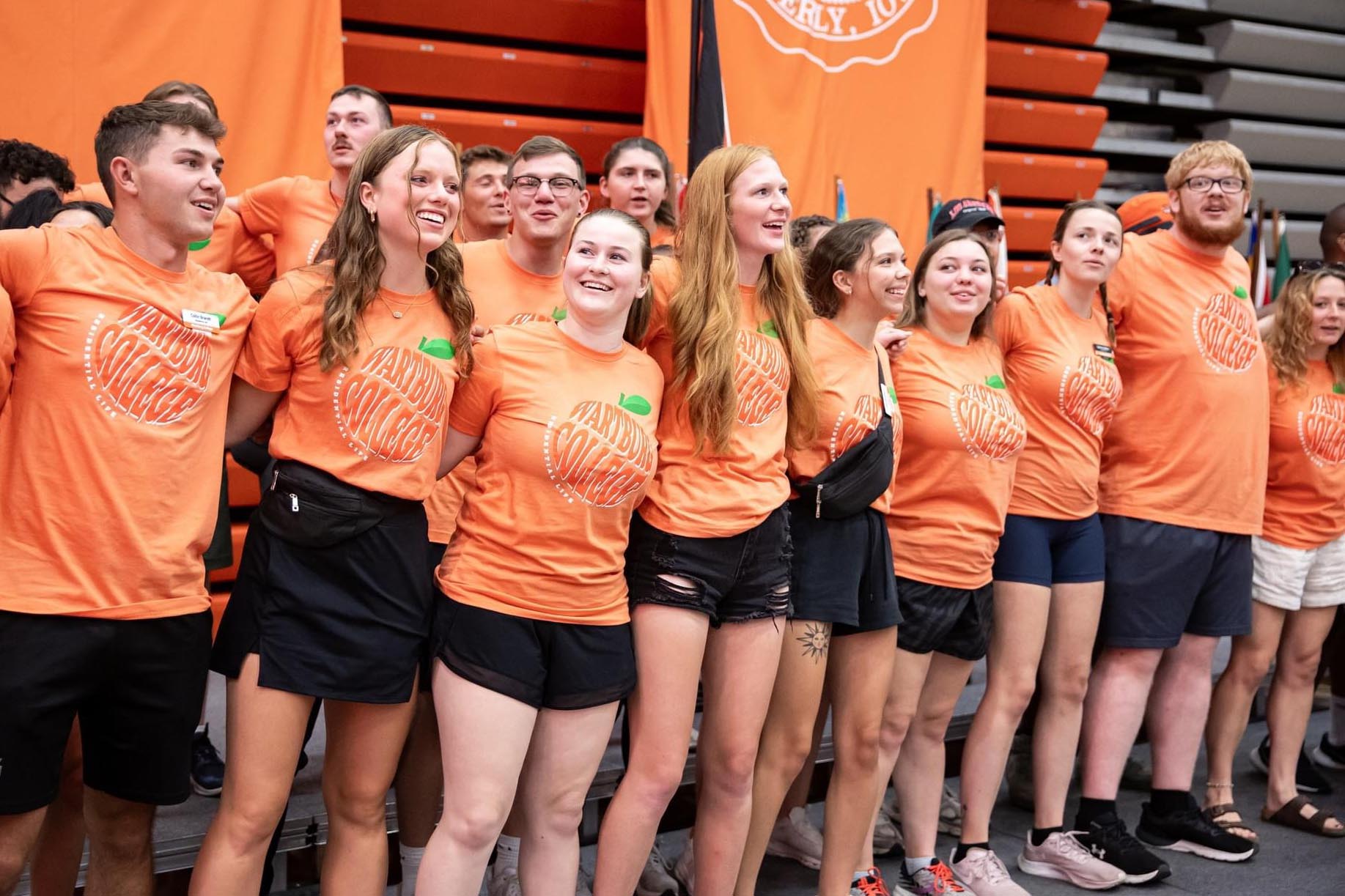 Nora Tweeten stands with other Orientation Staff members