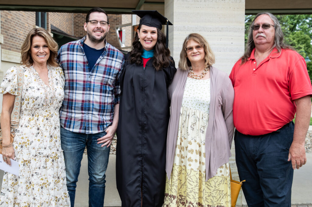 Graduate student celebrates with family